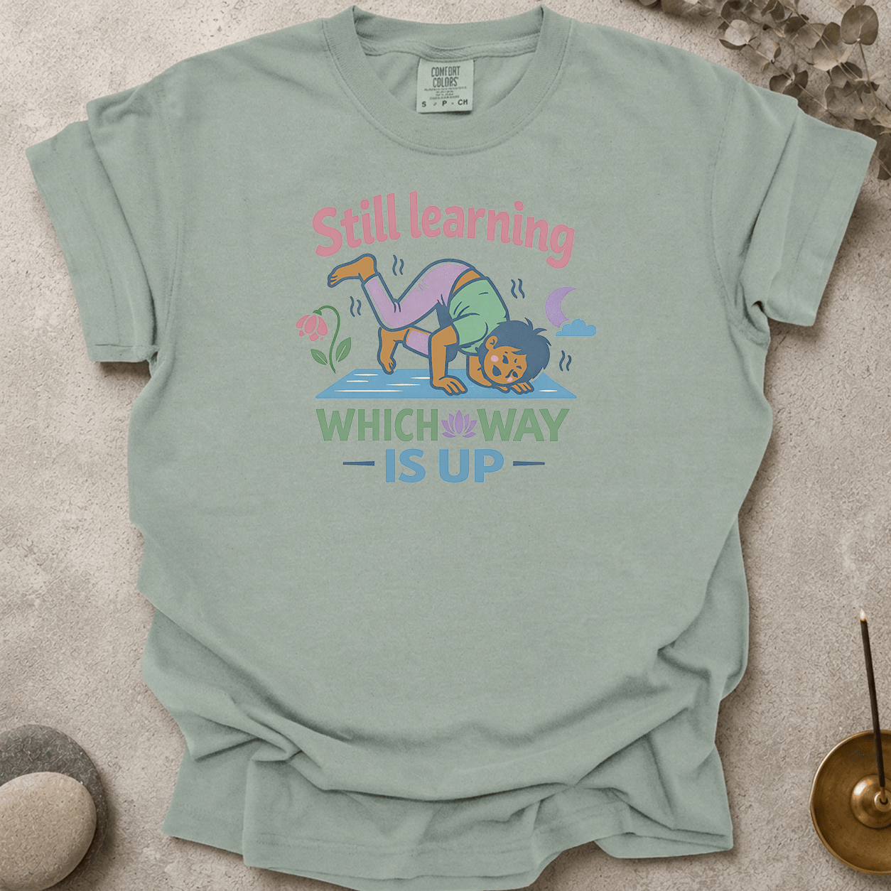 Still Learning Which Way is Up t-shirt